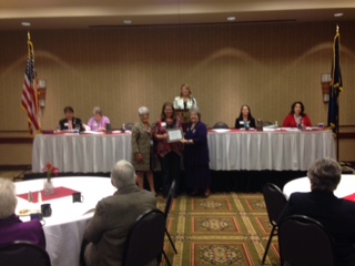 Club President Monica Gfoeller receives new membership certificate for 2014, for the fastest growing KFRW Club (i.e. NEJCRW Club)!